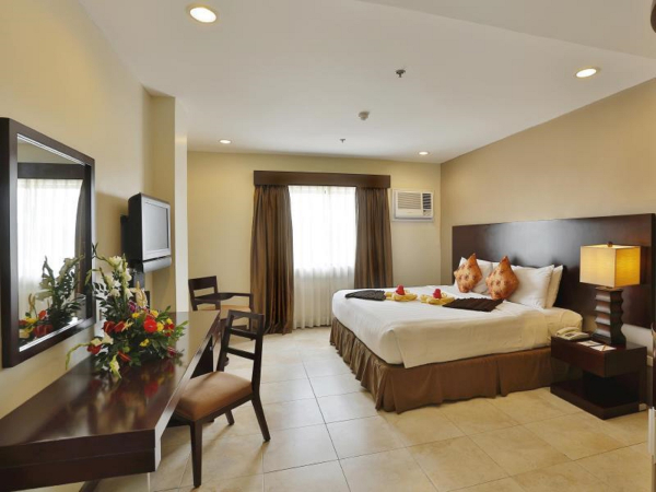 Las mejores ofertas de Alpa City Suites Mandaue