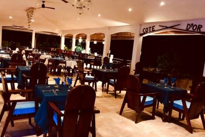 Creole Night Experience with Aperitive and Dinner in Hotel Cote D