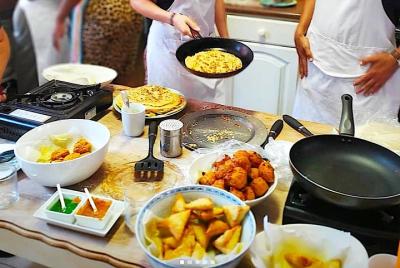 Cape Malay cocinando con un chef fundador