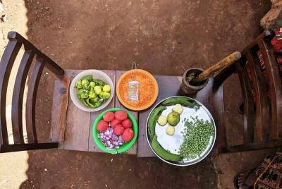Clase de cocina tradicional de Tanzania en Moshi con una familia  Clase de cocina tradicional de Tanzania en Moshi con una familia