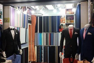 trajes a medida, camisas, pantalones, blusas y faldas