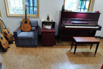 Taller privado de guitarra con músico vietnamita