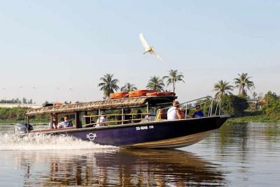 Los túneles de Cu Chi van en lancha rápida - Regreso en minivan T