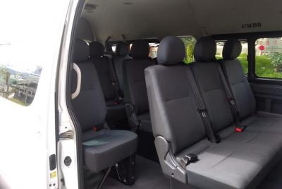 Traslado privado desde la estación de autobuses al hotel en la ci