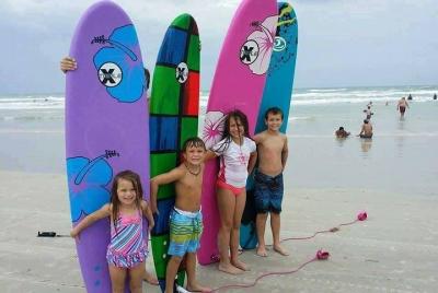 Aprende a surfear con una lección grupal de surf e instructor pro