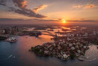 Vuelo privado en helicóptero al atardecer sobre Sydney y las play
