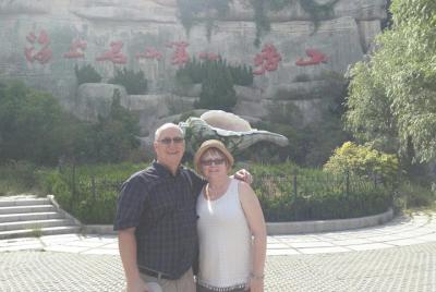 Qingdao Laoshan privado de medio día con una botella de cerveza T