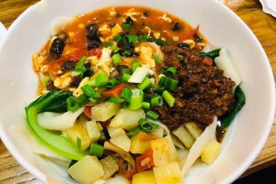 Excursión gastronómica de 3 horas en grupo pequeño a Xi'an con es