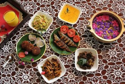 Demostración de cocina privada para su grupo en un hogar de Kochi Demostración de cocina privada para su grupo en un hogar de Kochi