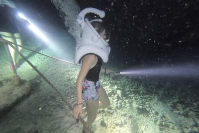 Experiencia de buceo nocturno submarino Sea Trek en Cozumel