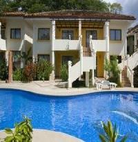 Las mejores ofertas de Tropical Gardens Suites & Apartments Coco Beach