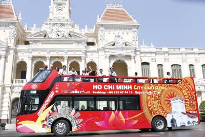 Tour por la ciudad de Ho Chi Minh: 1h en dos pisos - Pase del Palacio de la Independencia (1 o 2D)