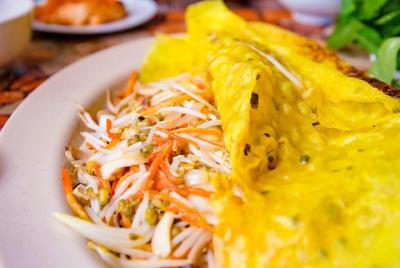 Tour privado de comida vegana en scooter en la ciudad de Ho Chi Minh