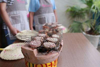Medio día Únase a la clase de cocina Saigon y al recorrido por el mercado de Ben Thanh