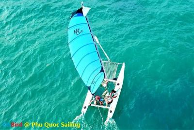 OnBird - Navegación a la isla de las tortugas en catamarán y puesta de sol en la playa de Casuarina