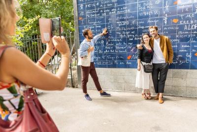 Tour guiado en audio por la bohemia de Montmartre con la basílica del Sacré Coeur Tour guiado en audio por la bohemia de Montmartre con la basílica del Sacré Coeur