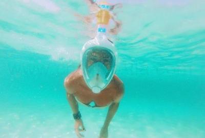 Excursión privada de día completo en catamarán a Playa de Llevant