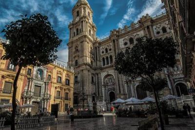 Malaga al anochecer  Malaga al anochecer