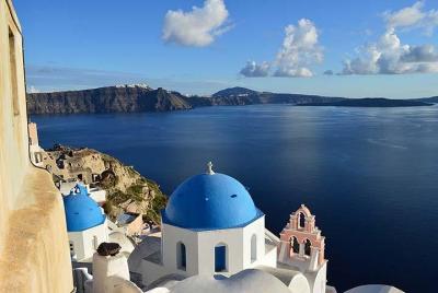 Recorrido en autobús tradicional de Santorini con atardecer en Oi