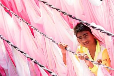 Dabbawala, Dhobi Ghat y Dharavi slum Tour en tren local