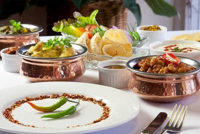 Experiencia de cena cocinada en casa de un grupo pequeño de Delhi