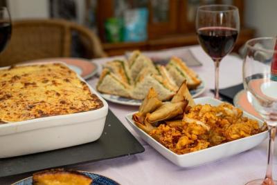 Experiencia gastronómica portuguesa privada con un local en su ca